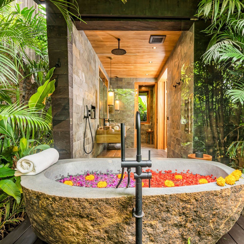 Plunge pool framed by natural stone walls